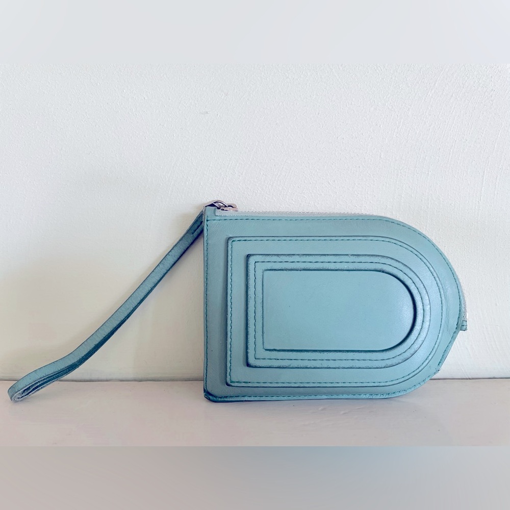 DELVAUX genuine leather wallet, aqua in color.